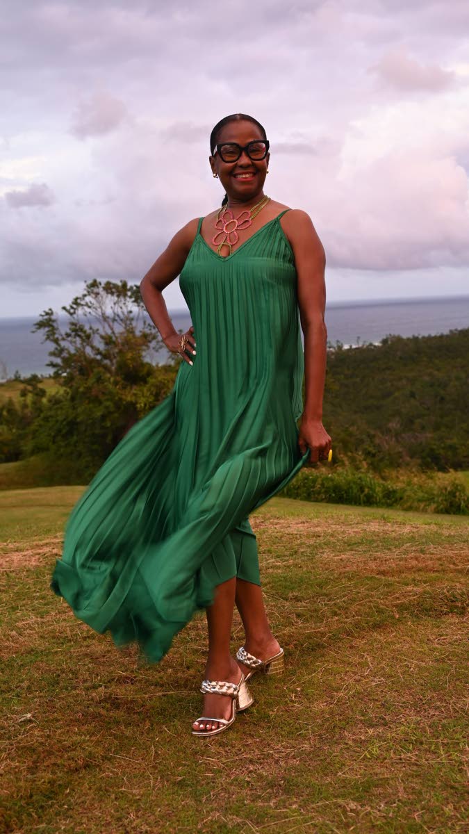 Tourism executive and empowerment speaker Marsha-Ann Donaldson pauses for a photograph. 