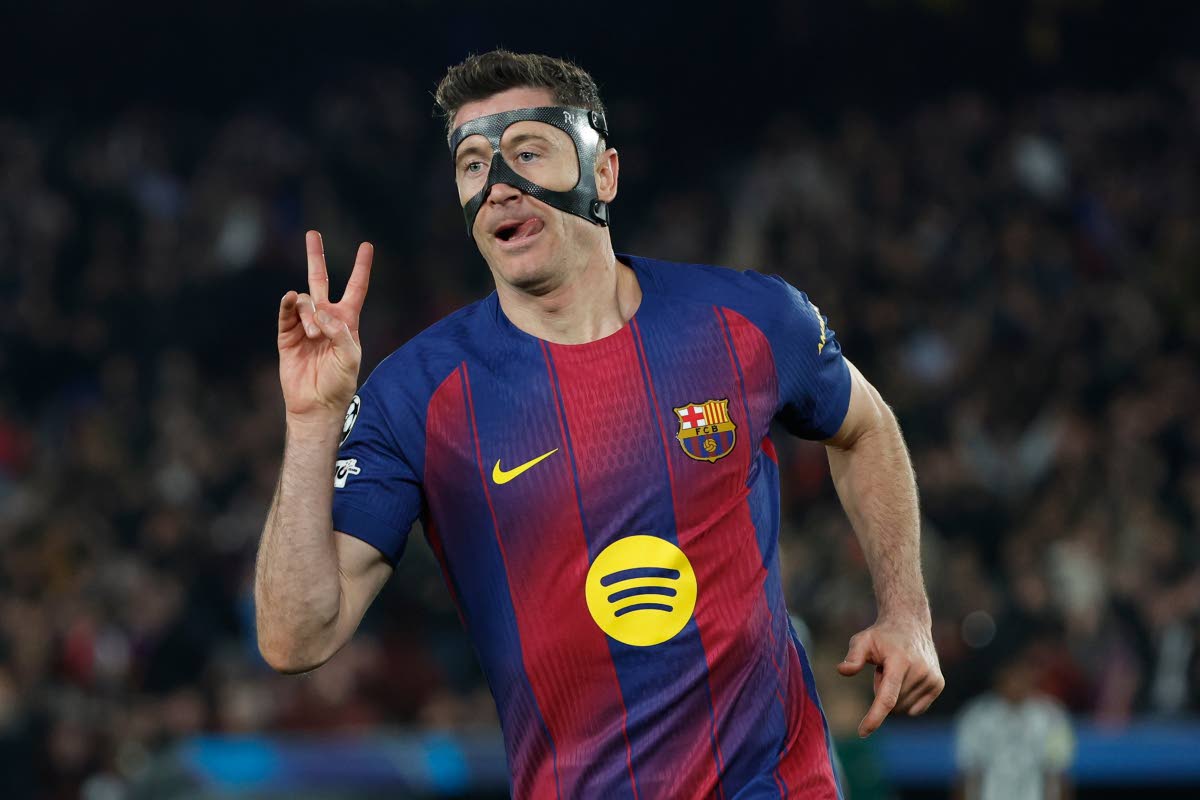 Barcelona's Robert Lewandowski celebrates after scoring his side's sixth goal during the Champions League round of 16, second leg football match between FC Barcelona and Newcastle United FC in Barcelona, Spain on March 18, 2026. (AP Photo/Joan Monfort)

