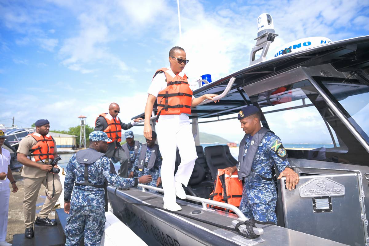 Acting Jamaica Defence Force Chaplain, Reverend Major Dwayne Blackwood, invokes blessings upon one of the newly acquired high-speed Surface Interceptor Vessels during a blessing ceremony at the Jamaica Defence Force Coast Guard, Port Royal, Kingston, on Ma