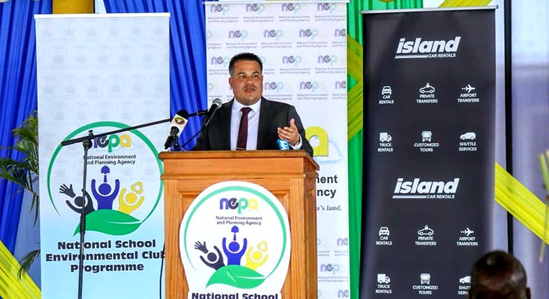 Matthew Samuda, minister of water, environment and climate change, delivers the keynote address at the recent National School Environmental Club Programme Workshop held at Titchfield High School.