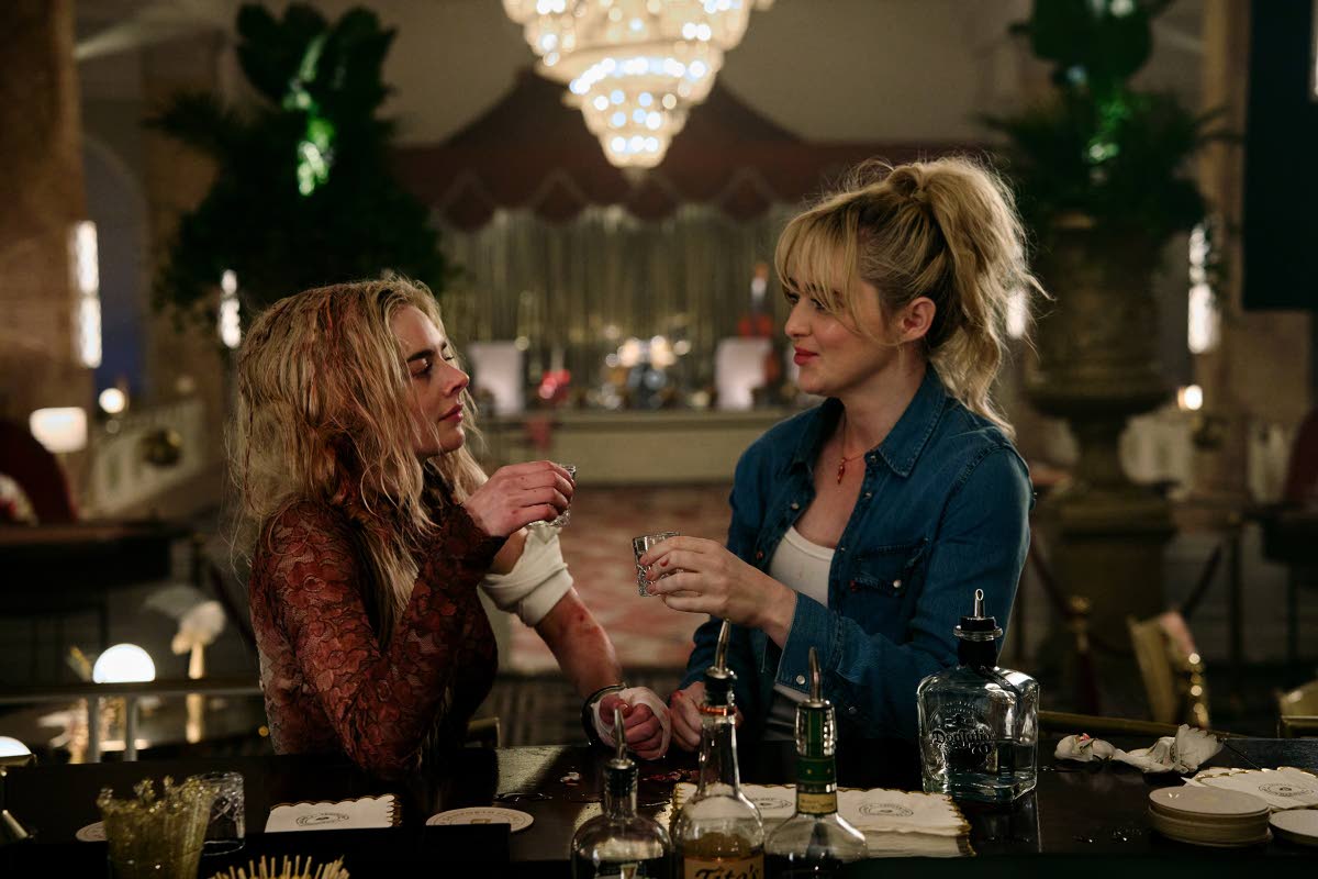 This image released by Searchlight Pictures shows Samara Weaving (left) and Kathryn Newton in a scene from ‘Ready or Not 2: Here I Come’.