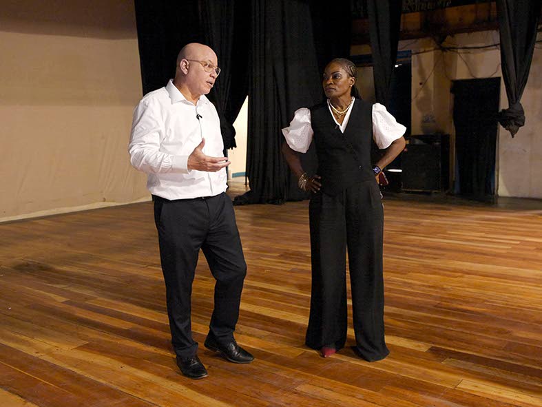 Jeffrey Hall (left), vice-chairman and CEO of Pan Jamaica Group, and Marisa Benain, executive director of the Little Theatre Movement Foundation, discuss the theatre’s need for a new cooling system and the importance of the preservation of historic cultu