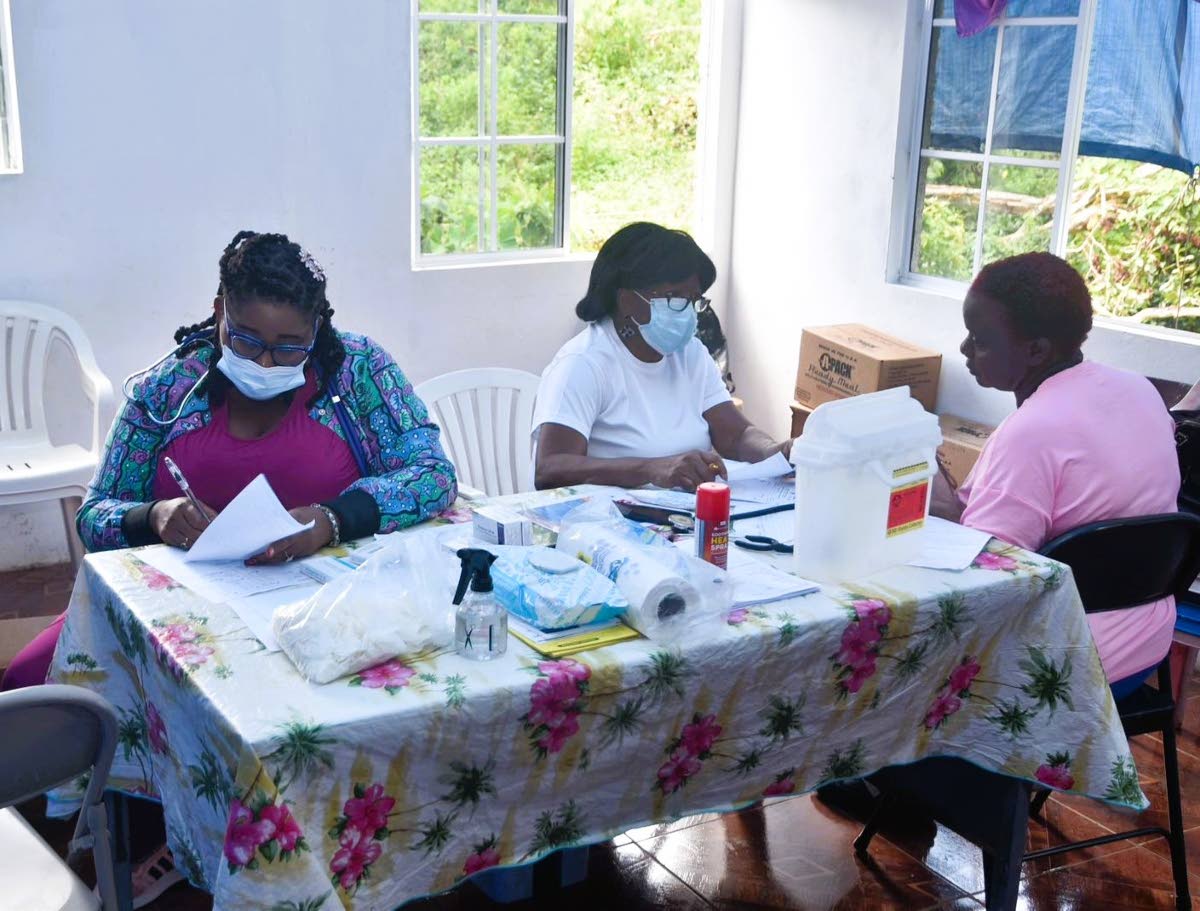 St John Ambulance medical team attends to a patient during one of their visits.