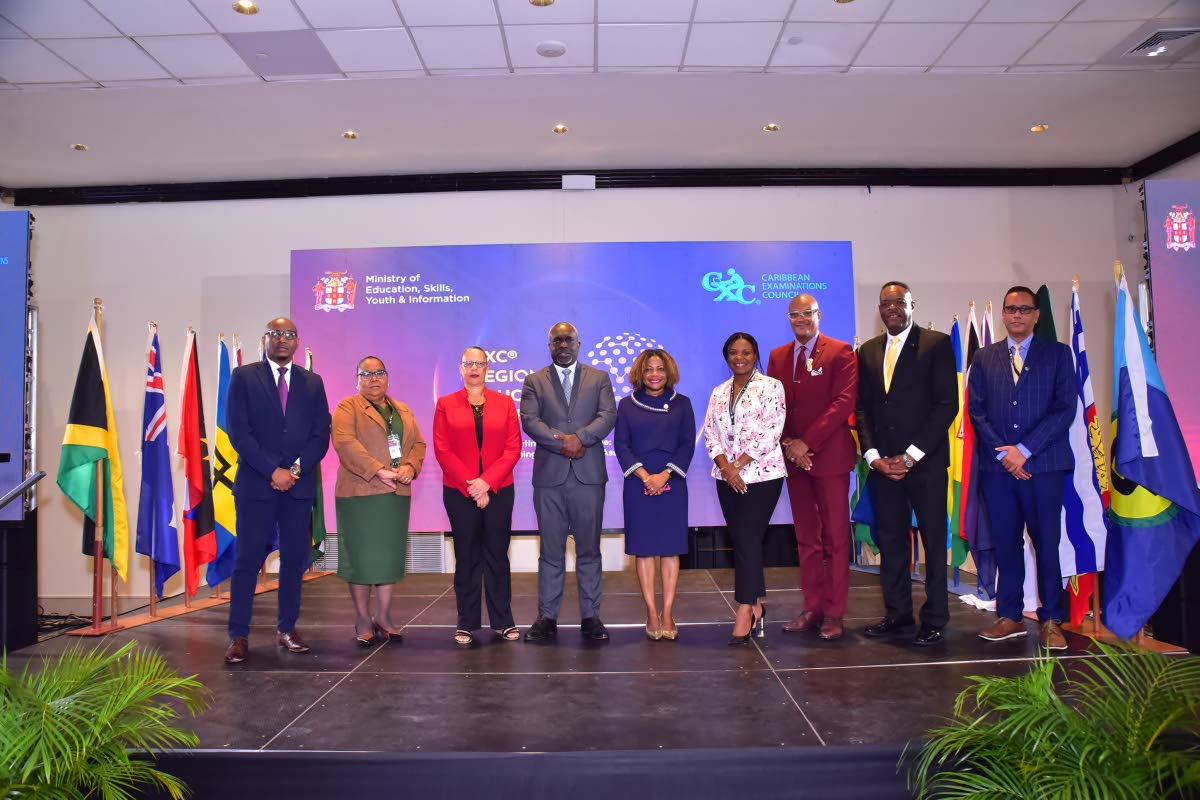 Several Caribbean ministers of education at CXC’s Inaugural Regional Education Conference and Ministerial Forum: From left are Danny Butcher, from Saint Lucia; Octavia Afred from Dominica; Marcia Potter, deputy chair of CXC; Phillip Jackson, from St Vinc