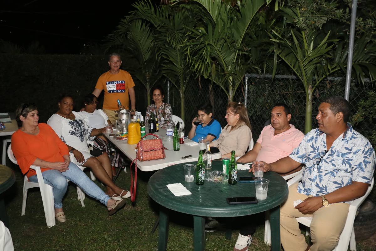 Some of the Cuban medical professionals and their families, hosted by Osmond Brown and his wife Karen, at farewell party in Kingston.