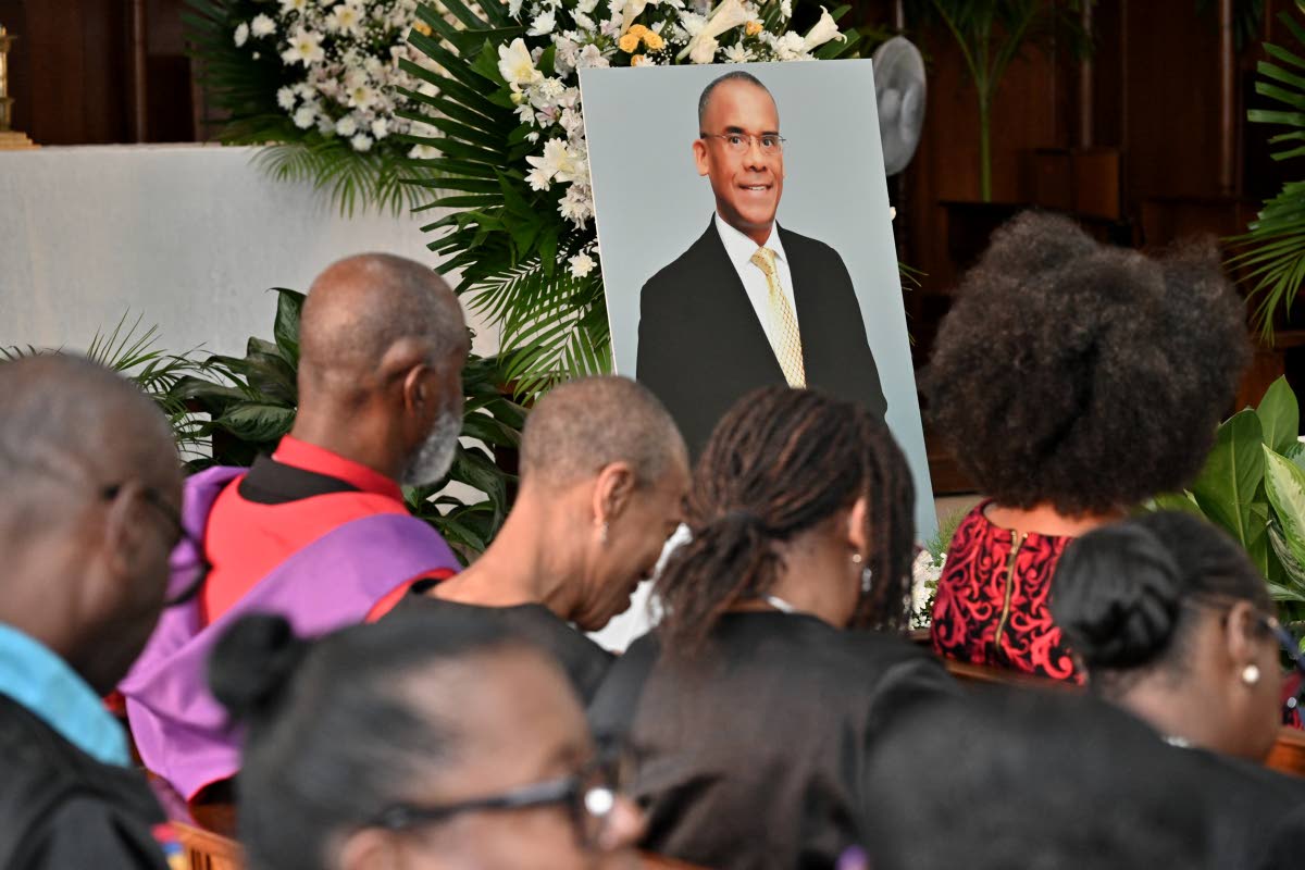 Mourners at the funeral for Dr Tomlin Paul, the late deputy principal of The University of the West Indies, Mona, held yesterday at the University Chapel in St Andrew. 