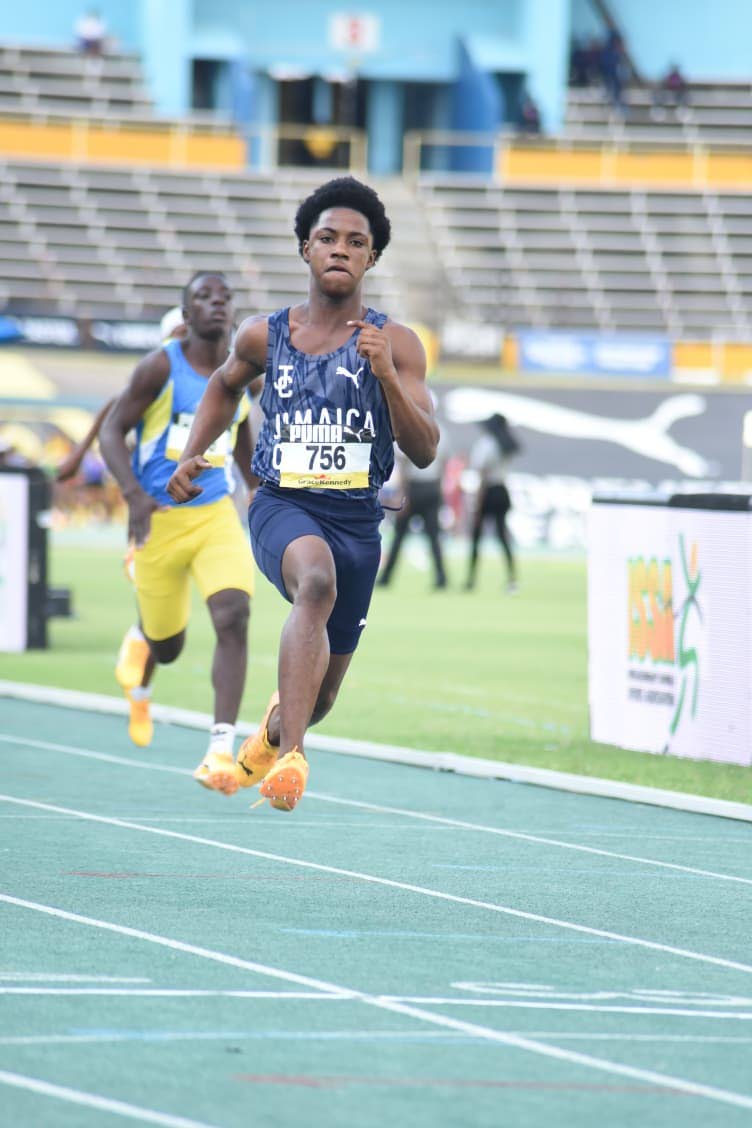 Jamaica College’s Adrian Phillips wins his heat (11.35) in the Boys’ Class Three 100m at the ISSA/GraceKennedy Boys and Girls’ Athletics Championships at the National Stadium on March 24, 2026. (Ian Allen photo)
