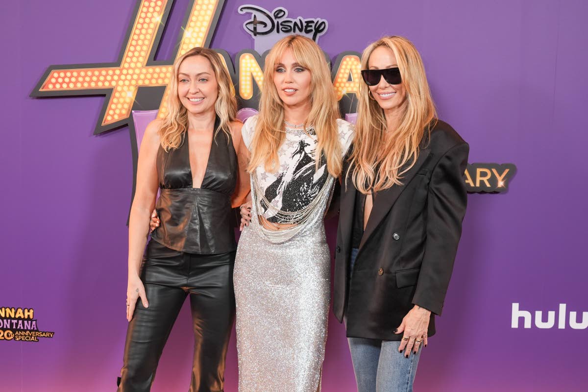 From left: Brandi Cyrus, Miley Cyrus, and Tish Cyrus-Purcell arrive at the premiere of the ‘Hannah Montana 20th Anniversary Special’.