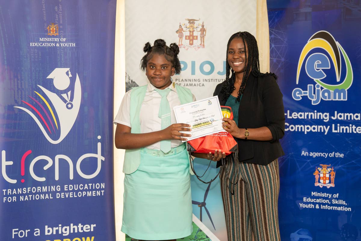 Dayanna Jackson of the Lister Mair Gilby School for the Deaf receives her certificate of participation and gift at the March 19 recognition ceremony in Kingston for students who participated in the Sustainable Development Goals (SDG) Youth Creative Express