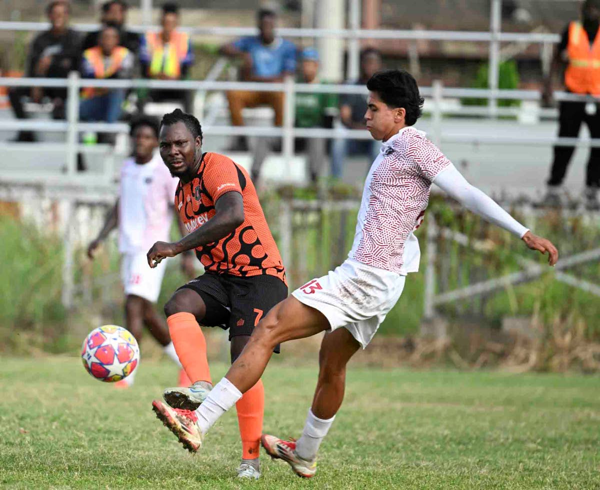 Tivoli Gardens’ Rodico Wellington (left) makes a pass while Chapelton Maroons’ Jerónimo Herrera Taborda tries to intercept during a Jamaica Premier League encounter at the Edward Seaga Sports Complex on December 29, 2025.