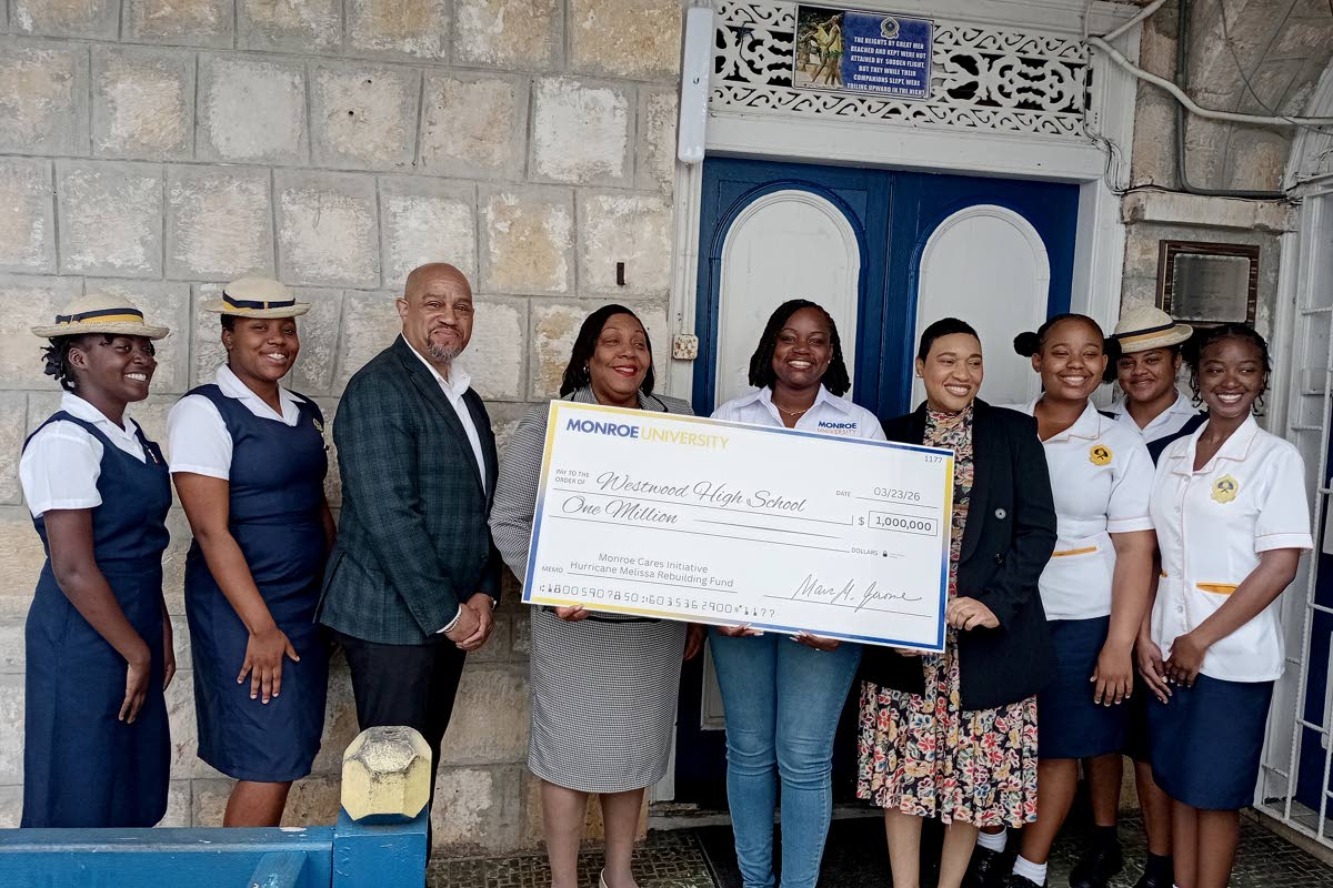 Third from left: Emerson Phillips, assistant vice-president, Monroe University; Karen Francis, principal, Westwood High School; Shanique McKenzie-Daniel, alumni director, Monroe University; Lorraine A. Myers, director of international admissions, Monroe Un