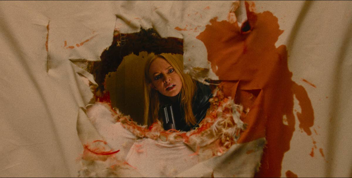 This image released by Warner Bros. Pictures shows Heather Graham in a scene from ‘They Will Kill You’.