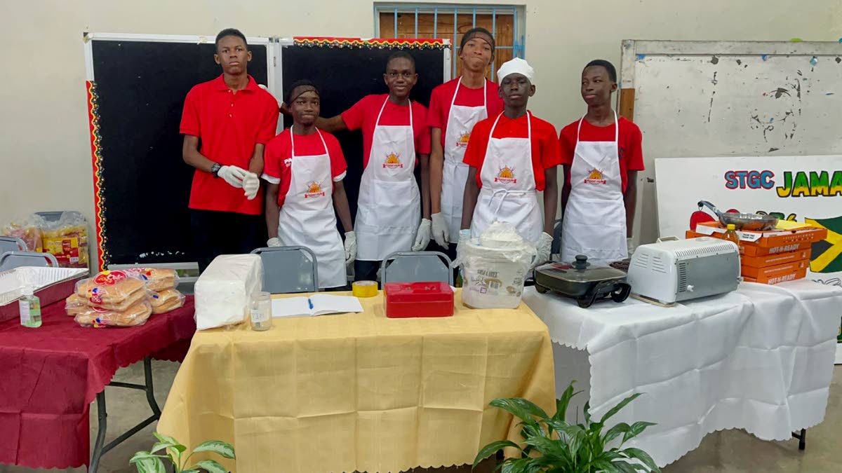 St George’s College students pose at a booth showcasing their food-service business at the recently held STGC Teen Biz Expo 2026.
