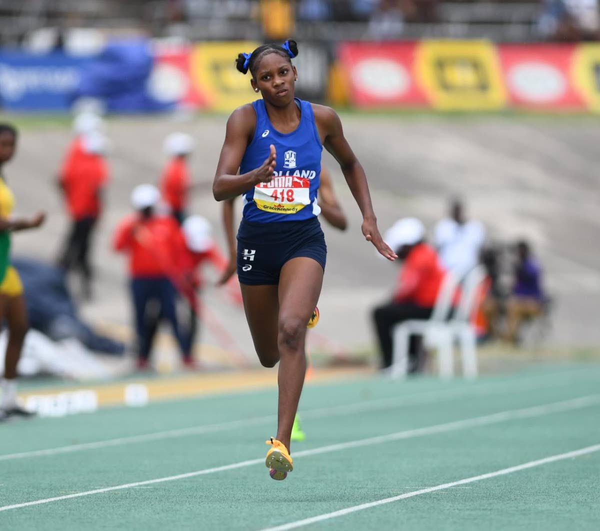 Shanoya Douglas on her way to winning the girls’ Class 1 200m in a championship record at the 2026 ISSA/GraceKennedy Boys and Girls’ Athletics Championships inside the National Stadium yesterday. 