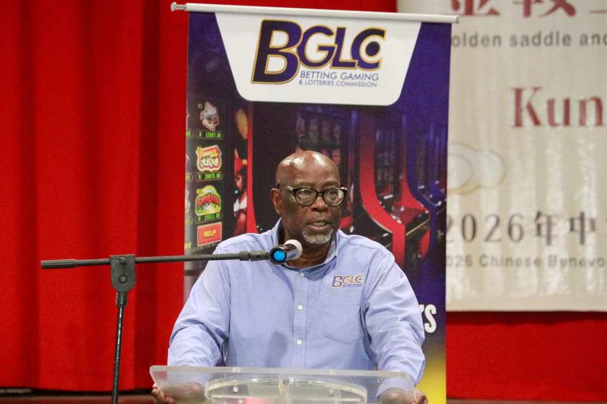 Vitus Evans, executive director of the Betting Gaming and Lotteries Commission, addresses the audience at the Commission’s recent stakeholder meeting at the Chinese Benevolent Association.