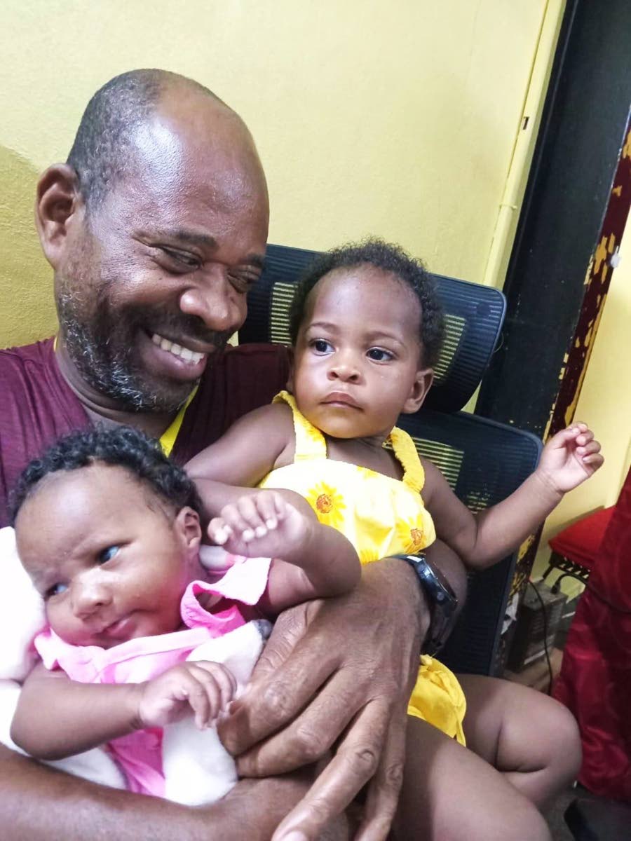 Dad Nathan Gardener, with Arielle and Anna-Olivia.