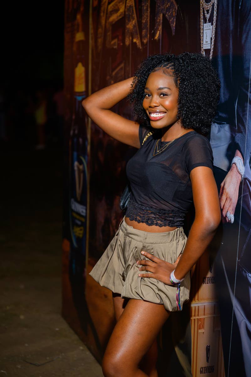 Britney Gayle gives extra lessons in posing as she marks the moment with a photo opportunity.