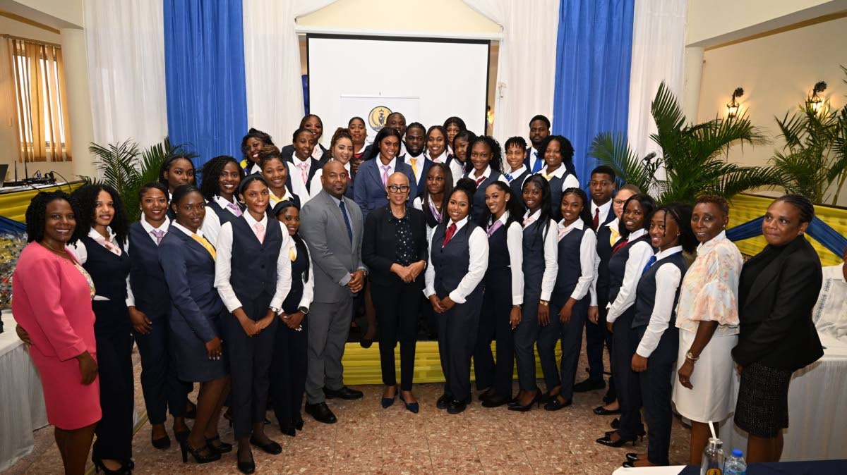 From left: Petula Senior, associate head of the School of Business Administration at the University of Technology; Dwight Crawford, deputy mayor of Montego Bay; Finance Minister Fayval Williams; and Olubusola Akinliagejo, acting dean of the College of Busi