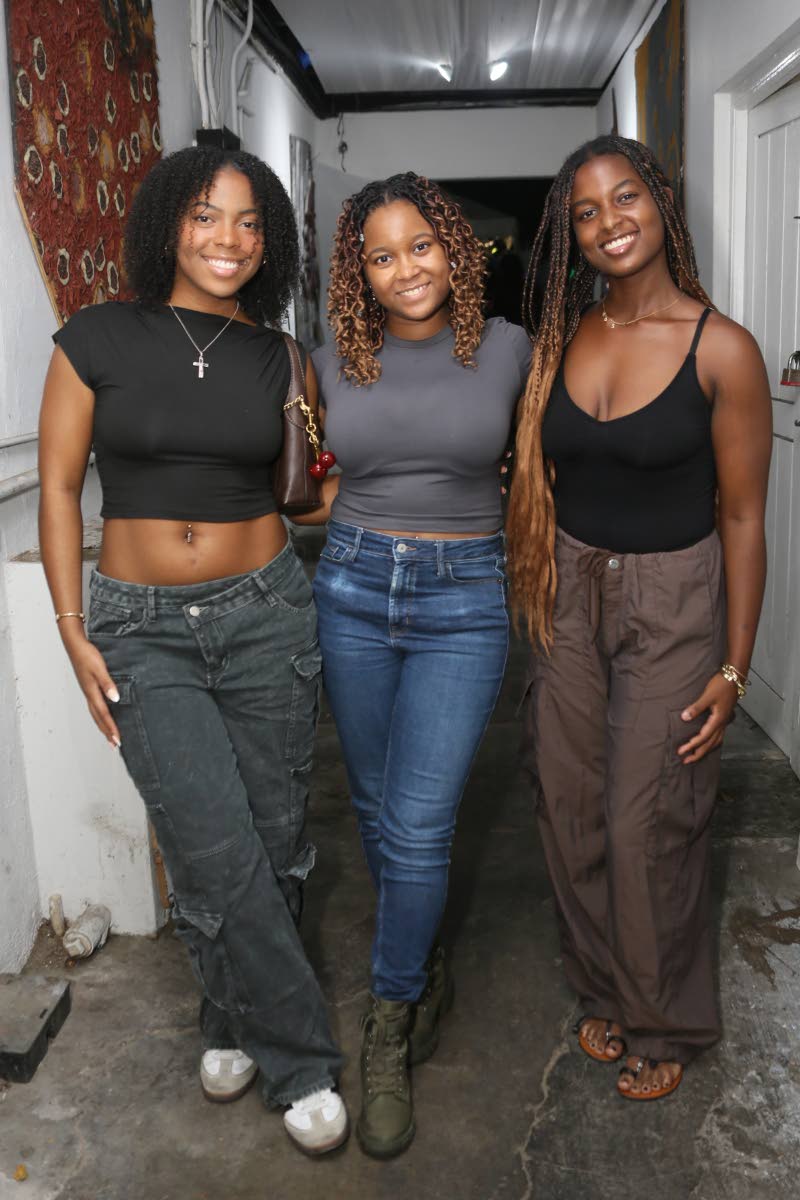 Sisters and Ahmeraki Café co-owners (from left) Amanda, Alyssa and Amelia Hutton welcomed patrons to the pool deck for the Rhythm Sundays showcase.