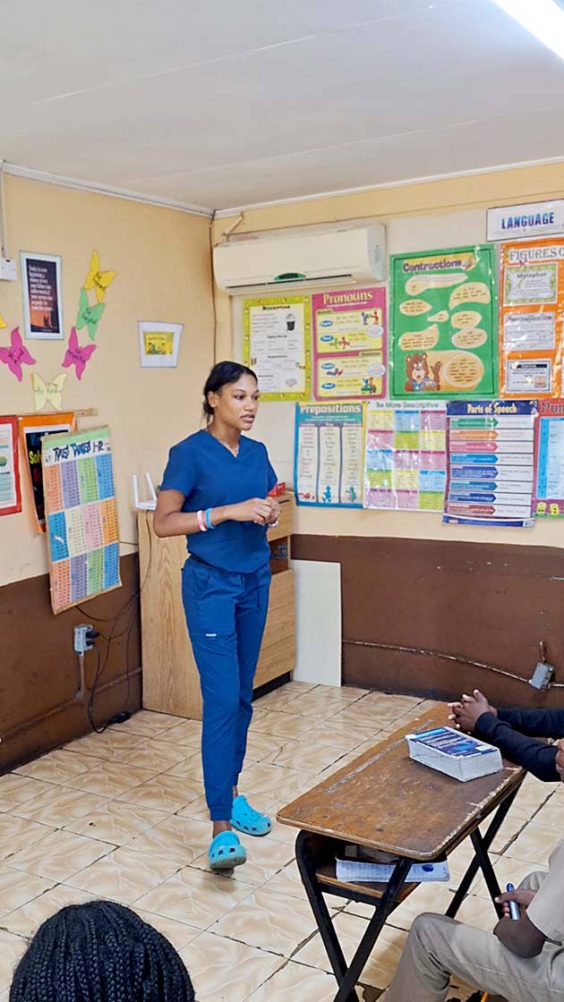 Dental hygienist Shennel Noble speaks to students about oral health during the Santa Cruz Family Dental‑led ‘Sweet Smiles, Smart Choices’ campaign. 