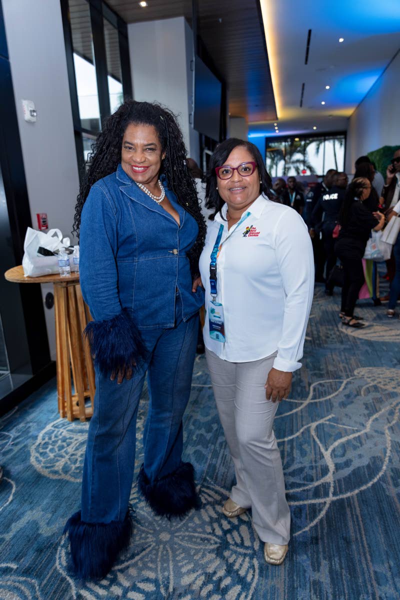 Chef Jacqui Tyson (left), CEO and founder of From Thought to Finish, pairs up with Ingrid Banton, marketing officer at The Best Dressed Chicken, for a quick photo.