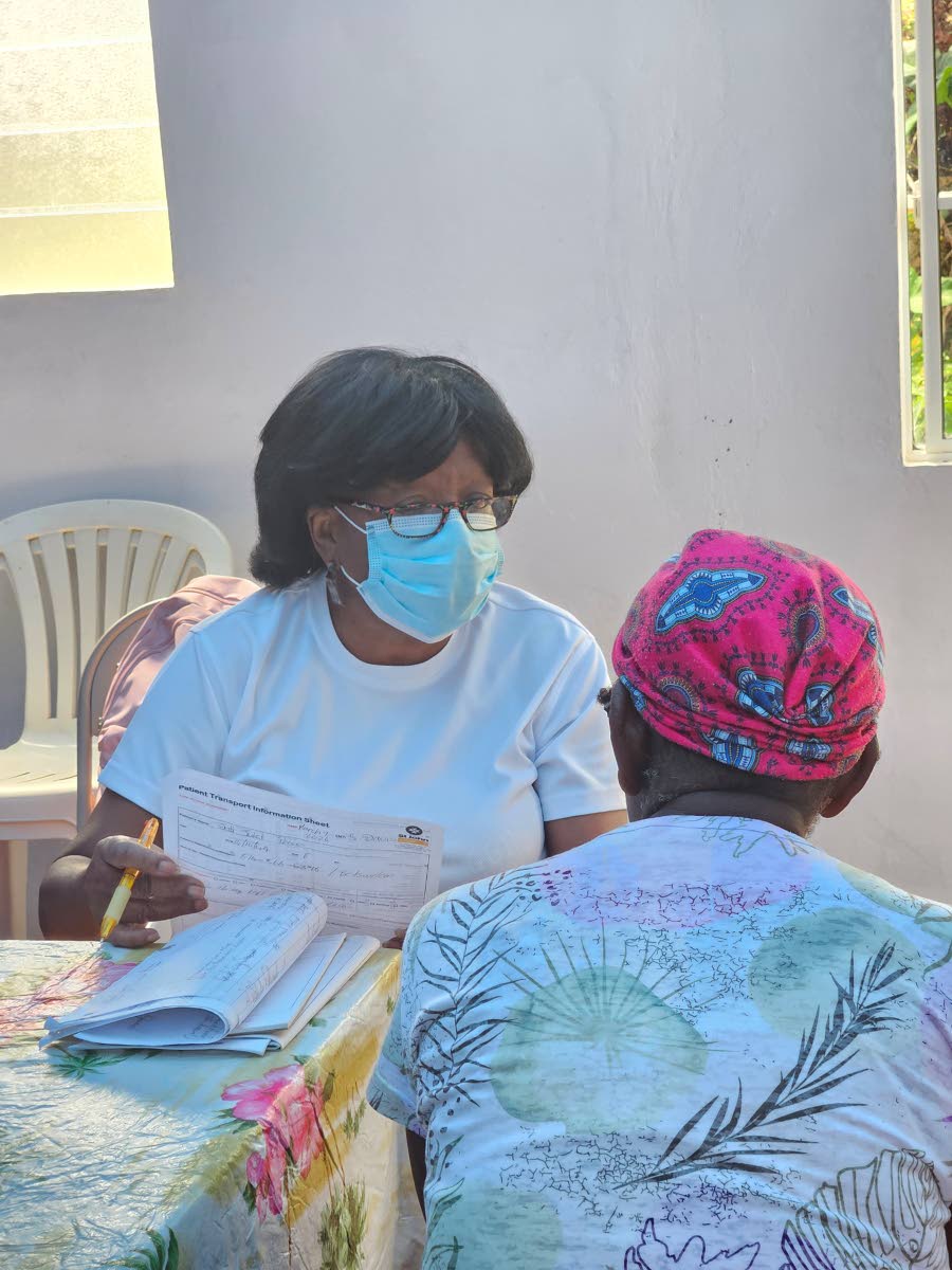 A medical doctor from St John Ambulance Jamaica sees a resident of Harmony Hall, St Elizabeth, during a recent visit to the remote community. The mission was organised by the JN Foundation with funding from Corus International, an ensemble of faith-based o