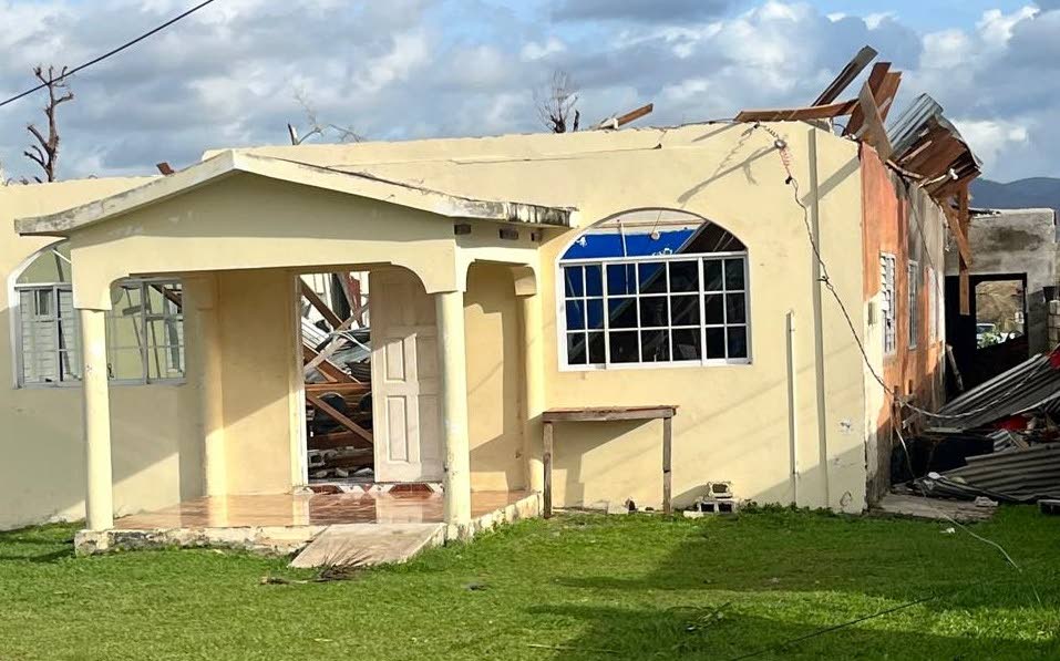 The Logos International Worship Centre in Morass, Hertford District, Westmoreland, shows extensive damage following Hurricane Melissa, as congregations continue to gather under a tarpaulin ahead of Easter.