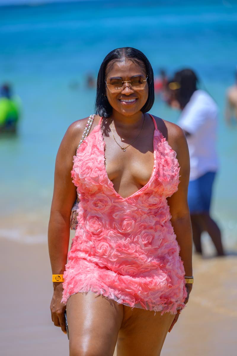 Shanell Garvin swipes right on soft florals by the shoreline.