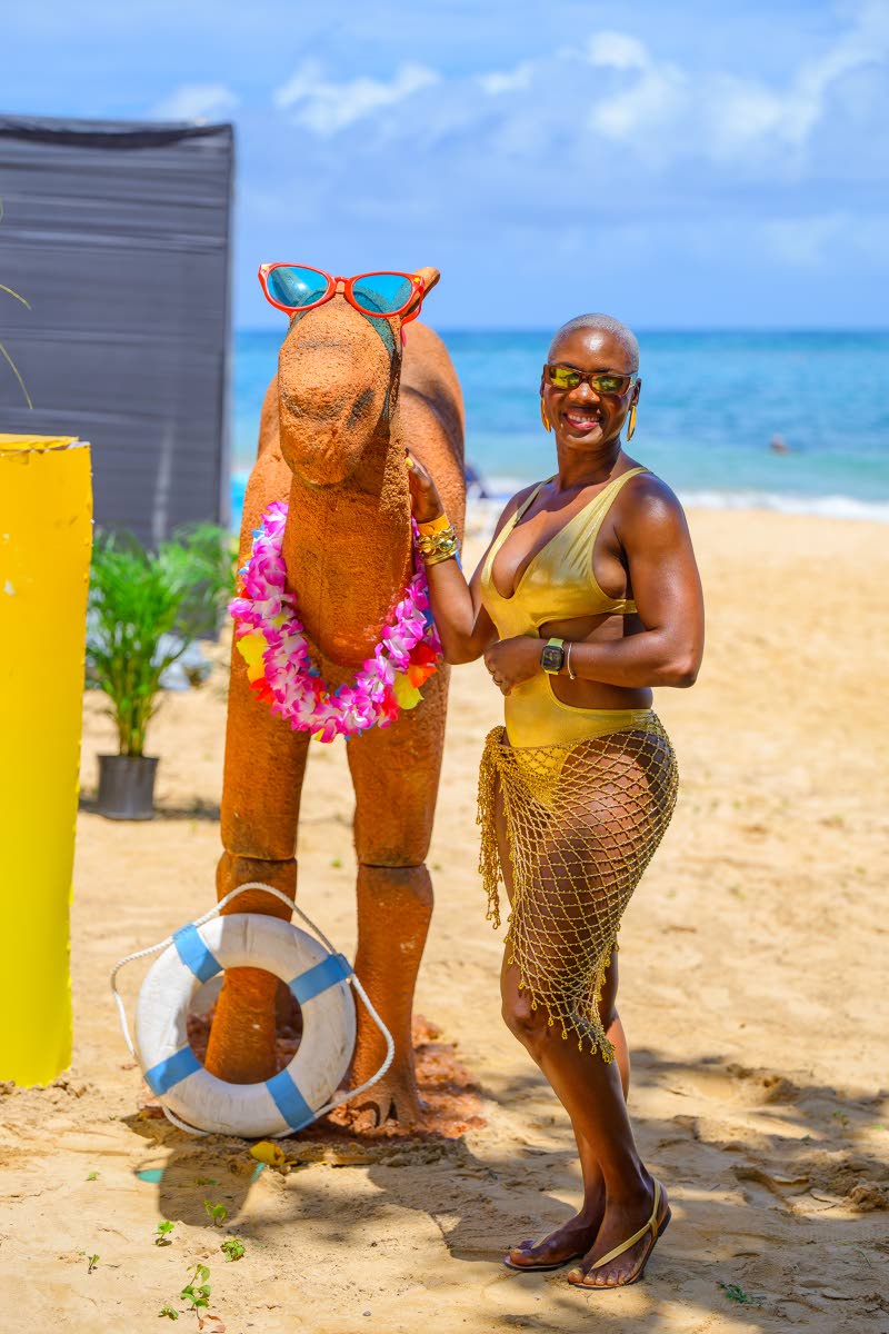 Dental hygienist Sandra Kerr shows off her pearly whites on the pearly shores.