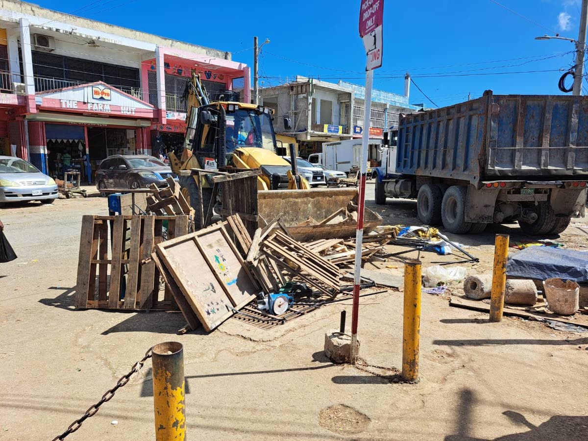 Vendors’ pallets, carts, and other confiscated items being hauled away following an early-morning operation at the Charles Gordon Market in Montego Bay, St James, on Friday, April 10, 2026.