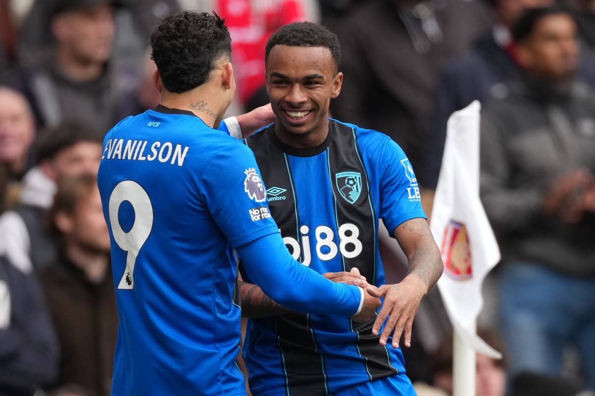 Bournemouth's Evanilson, and Eli Junior Kroupi celebrate after scoring during the Premier League soccer match between Arsenal and Bournemouth in London, England on Bournemouth's Evanilson, and Eli Junior Kroupi celebrate after scoring during the Premier Le