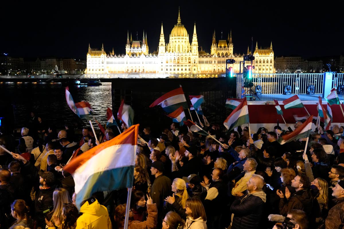 Supporters of Peter Magyar, the leader of the opposition Tisza party, celebrate after a parliamentary election in Budapest, Hungary, yesterday.