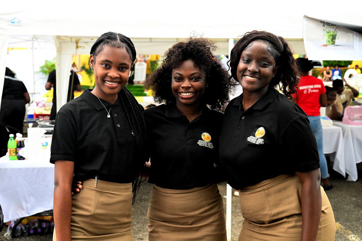 Students of the College of Agriculture, Science and Education in Portland (from left), Janane Terrelonge, Shanika Robinson, and Alicia Myers, who were members of the student-operated business, ‘Sweet & Savoury Bites’, whose booth was featured at the in