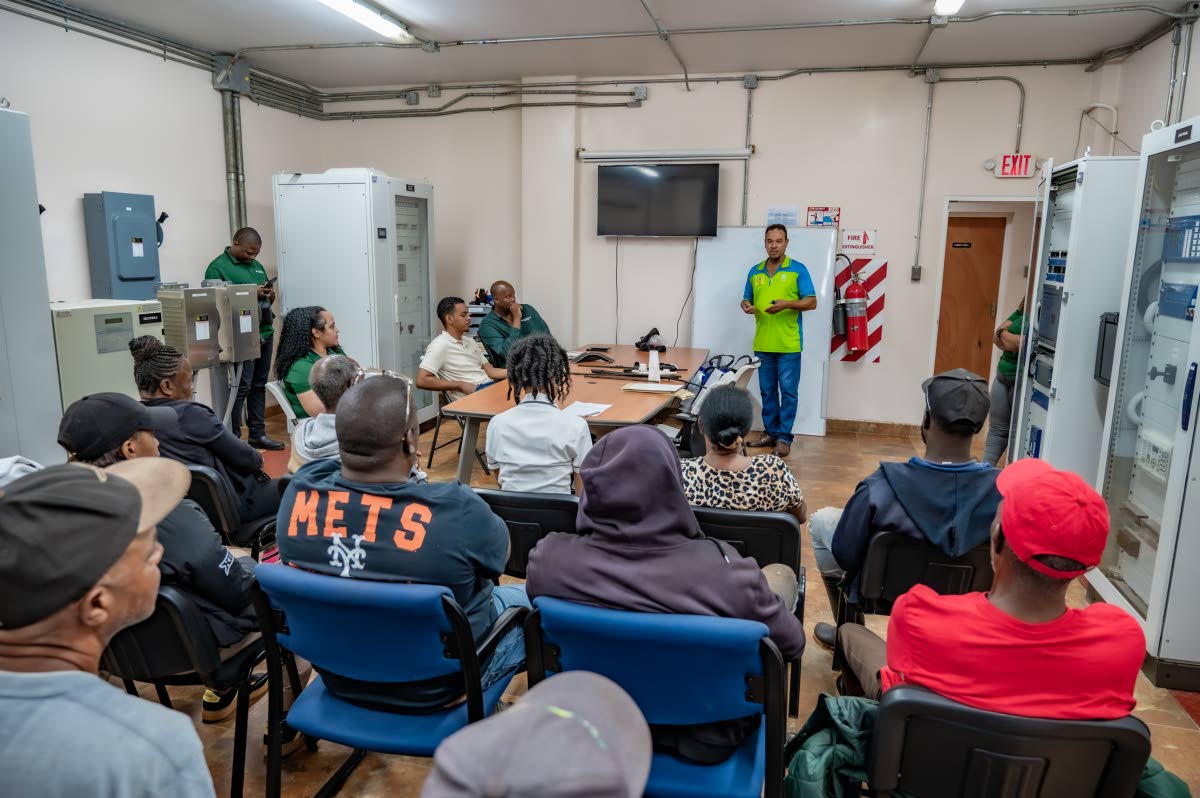 Jamaica 4-H  Clubs centre manager, Michael Powell, leads a drip irrigation and water harvesting session for farmers in St Elizabeth.