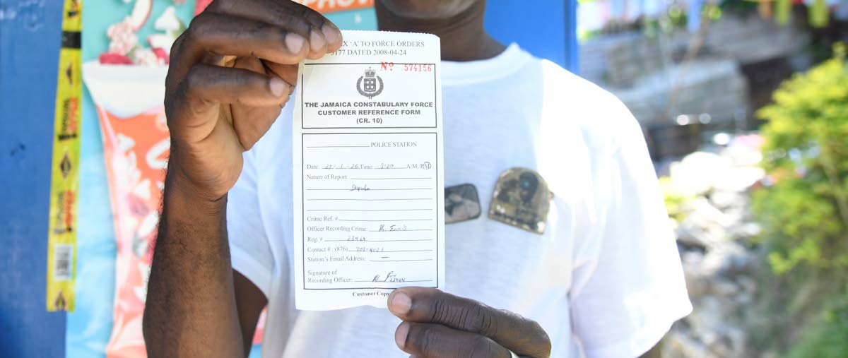 The father of the student who reportedly fatally stabbed Kland Doyle shows a police receipt indicating that the dispute between the two boys have been longstanding and reports have been made to the police.