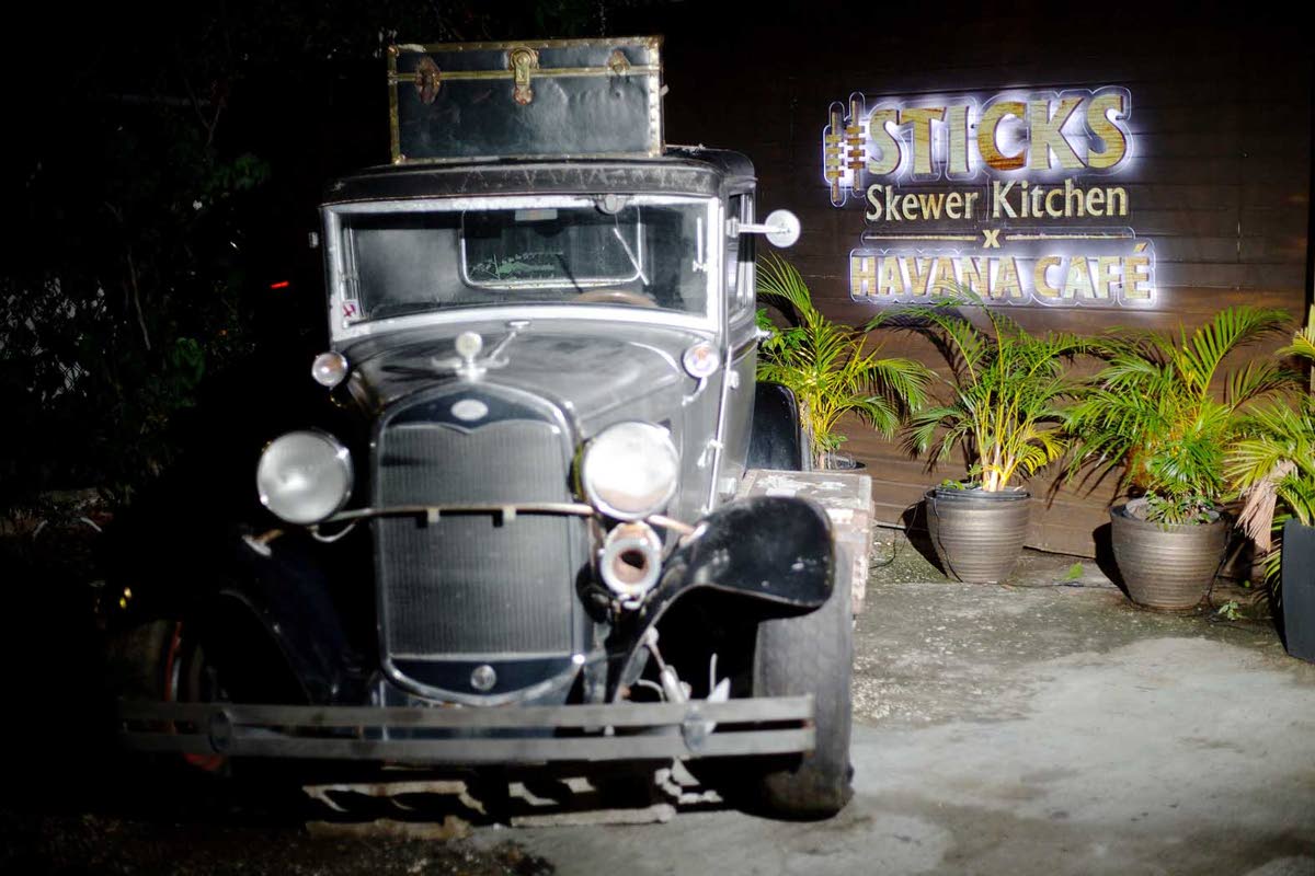 Honouring the Cuban culture, customers are greeted by this cool vintage car at the entrance of the café and kitchen.
