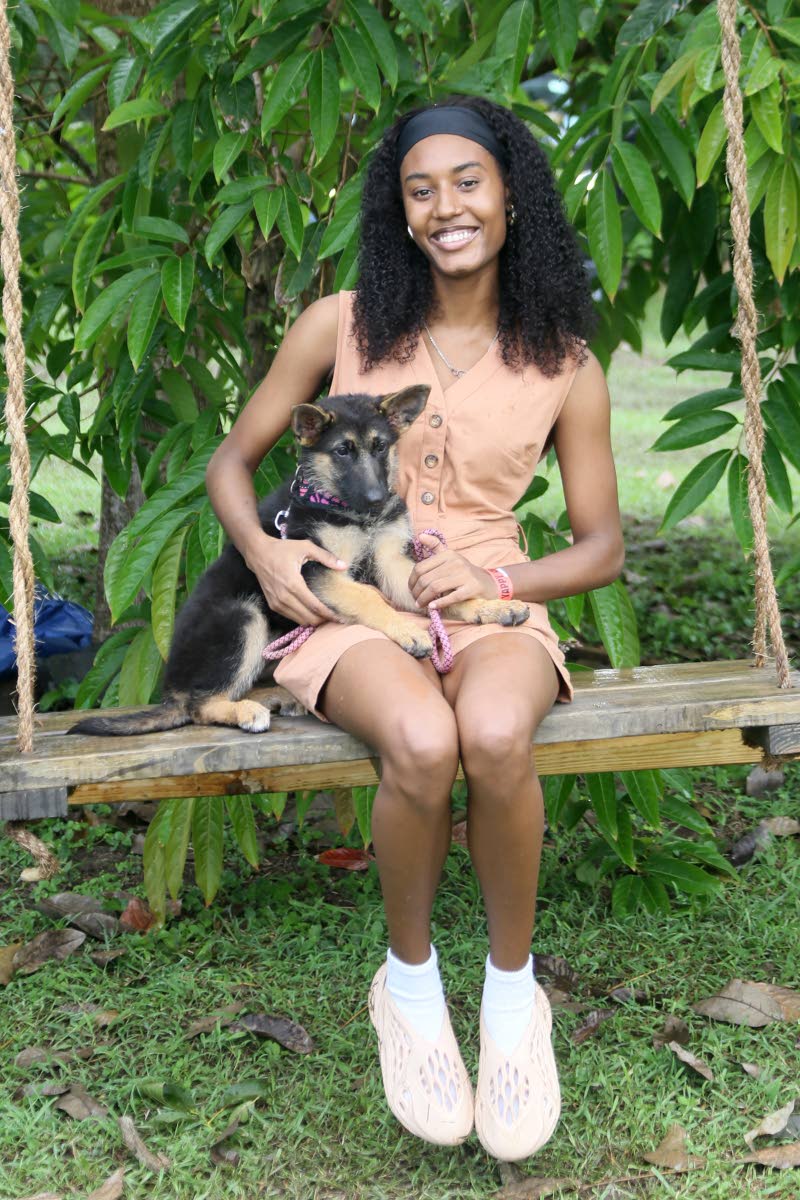 Entrepreneur Chinneeka Young and her new German Shepherd pup, Ella, are out for some fun, getting the little one acquainted with new furry friends.

