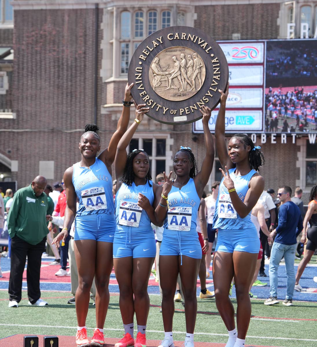 Members of the Edwin Allen High sprint relay team who won the Championship of America  4x100 metres title at the Penn Relays in Philadelphia yesterday. From left: Alexxe Henry, Moesha Gayle, Reneica Edwards and Kelly Ann Carr. 
