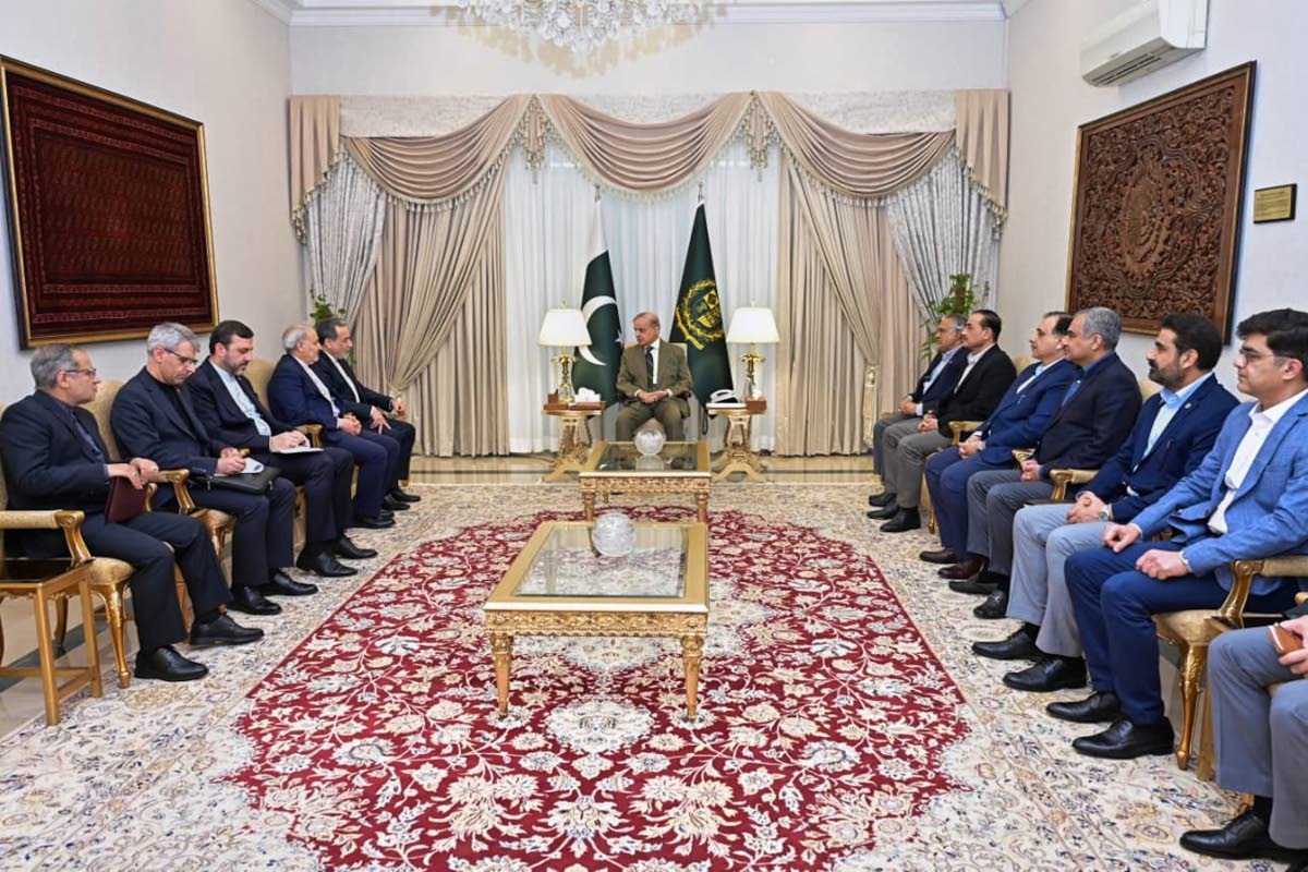 In this photo released by the Pakistan Prime Minister Office, Iran's Foreign Minister Abbas Araghchi, fifth left, meets with Prime Minister Shehbaz Sharif, center, in Islamabad, Pakistan on April 25, 2026. (Pakistan Prime Minister Office via AP)