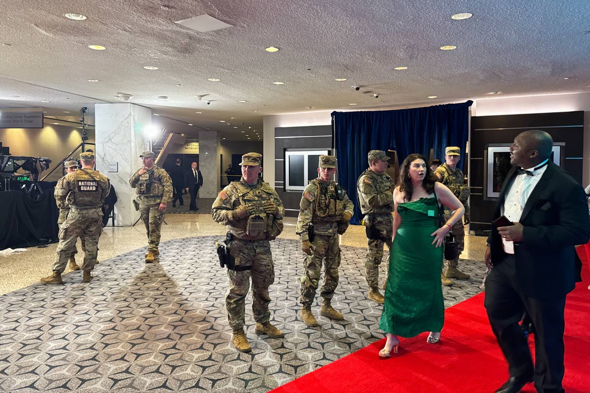 The National Guard respond to an incident at the White House Correspondents Dinner on April 25, 2026, in Washington. (AP Photo/Mark Schiefelbein)