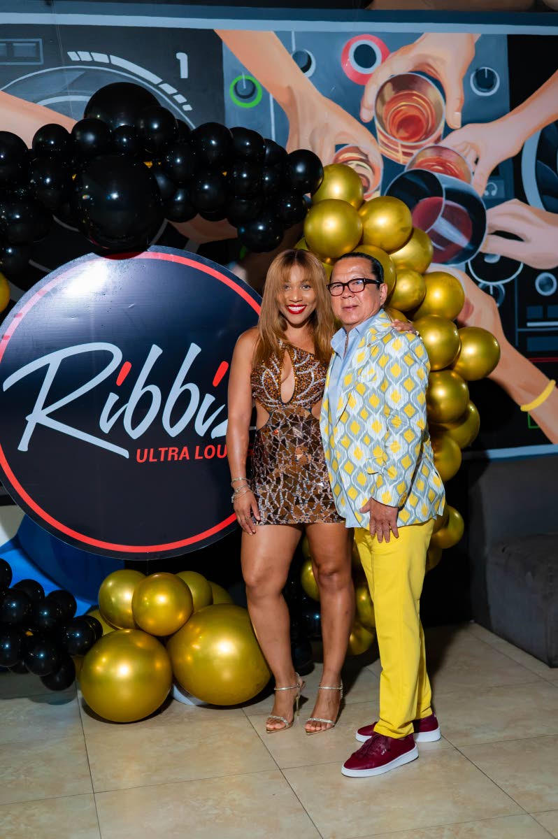 Man of the moment, Brian ‘Ribbie’ Chung, steps into the spotlight with his significant other, Roshani Howard, at his 67th birthday celebration at Ribbiz Ultra Lounge last  Thursday.