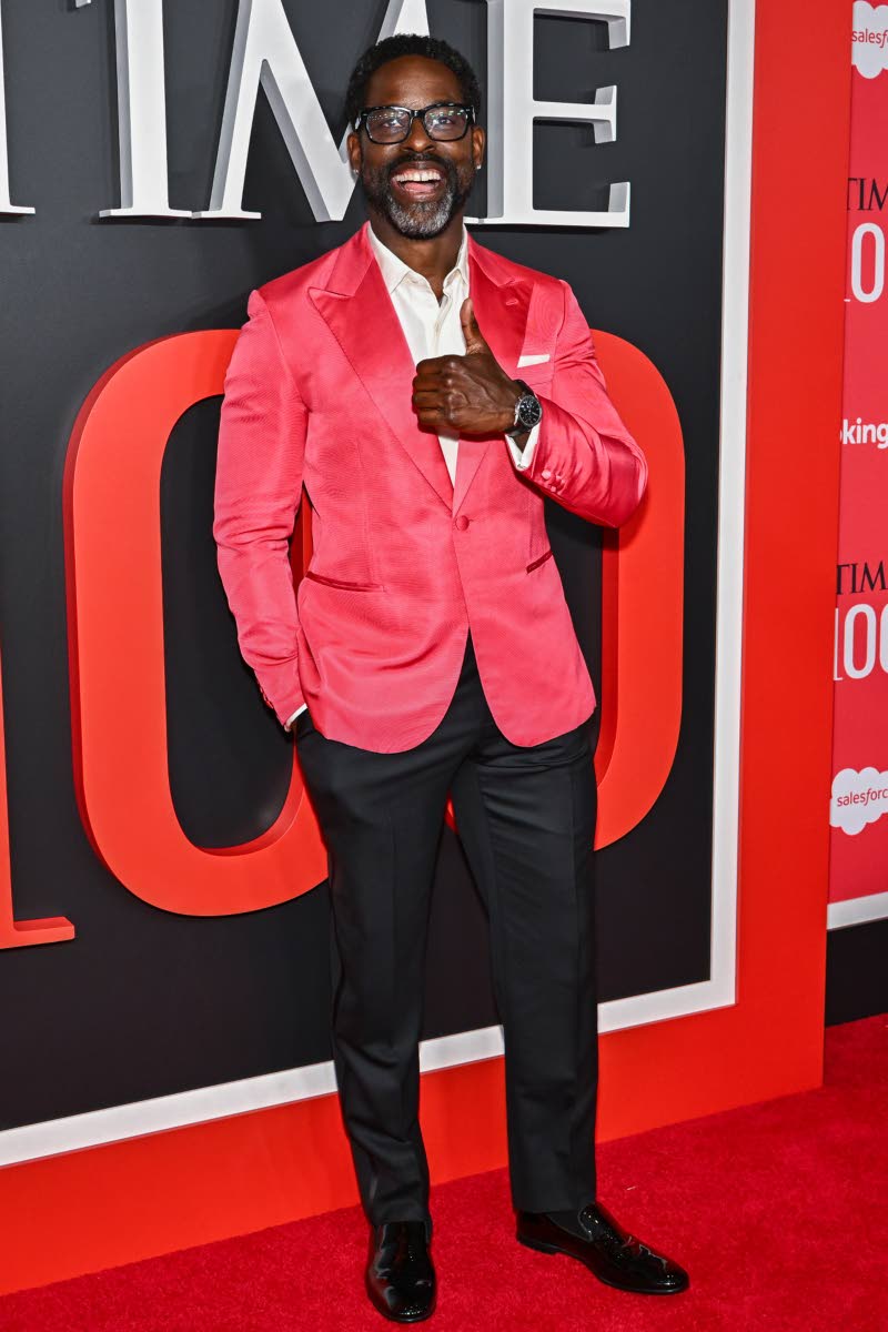 Among TIME’s most influential people of 2026, Sterling K. Brown makes a statement in classic Brioni tailoring, punctuated by a vivid red jacket.