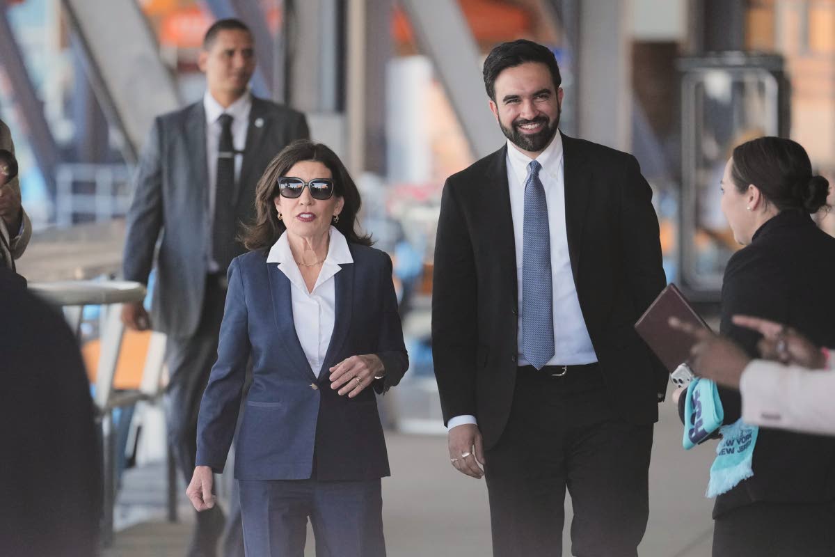 New York Governor Kathy Hochul and New York City Mayor Zohran Mamdani arrive to a news conference in the Staten Island borough of New York, Monday, April 27, 2026. (AP Photo/Seth Wenig)