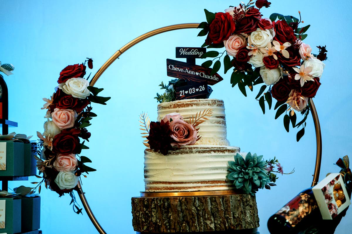 Baked and designed with love in mind, Llalleen Mills of Llal’s Kitchen created the Bryans’ wedding cake.