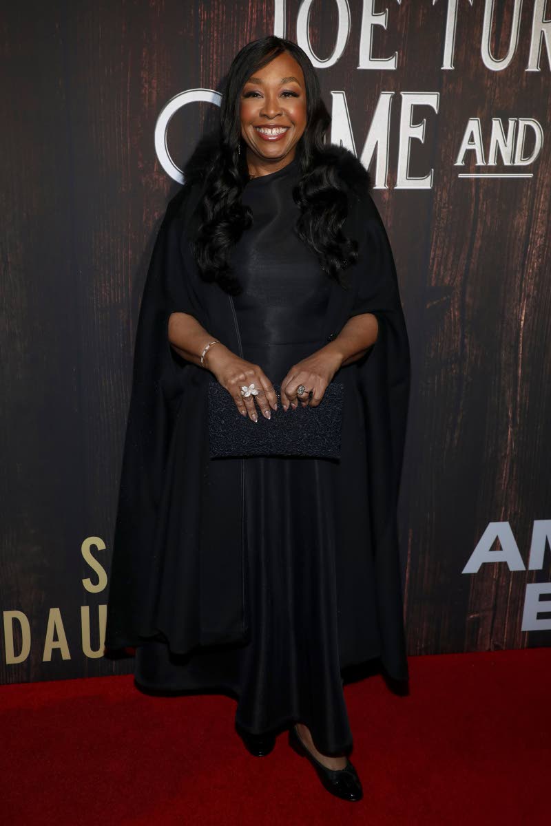 Spotted: Award winning TV producer and writer Shonda Rhimes, soaks up the occasion dressed in all black.
