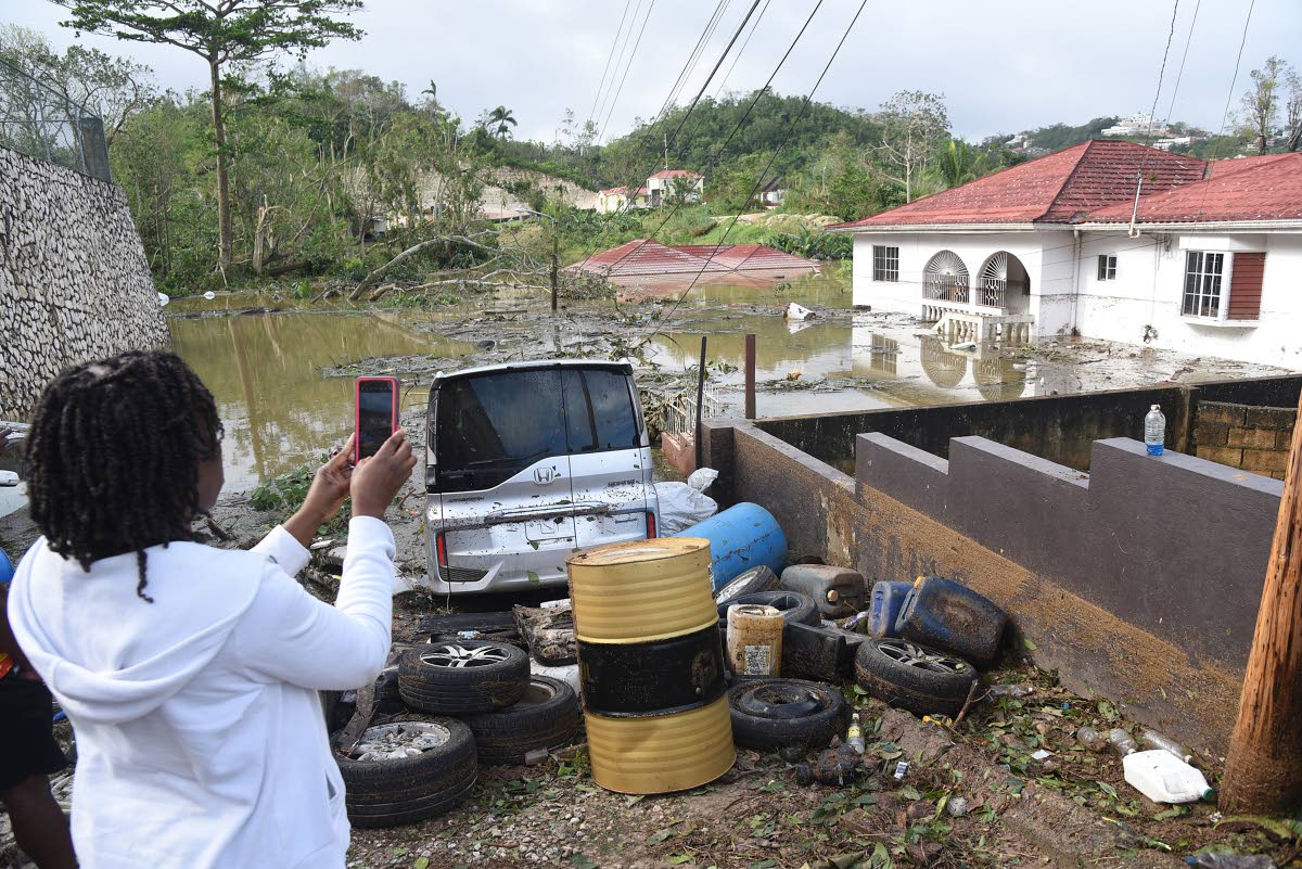THEN: Leebert Campbell’s home was one of three left submerged by Hurricane Melissa on Gibson Close in Mandeville, Manchester.
