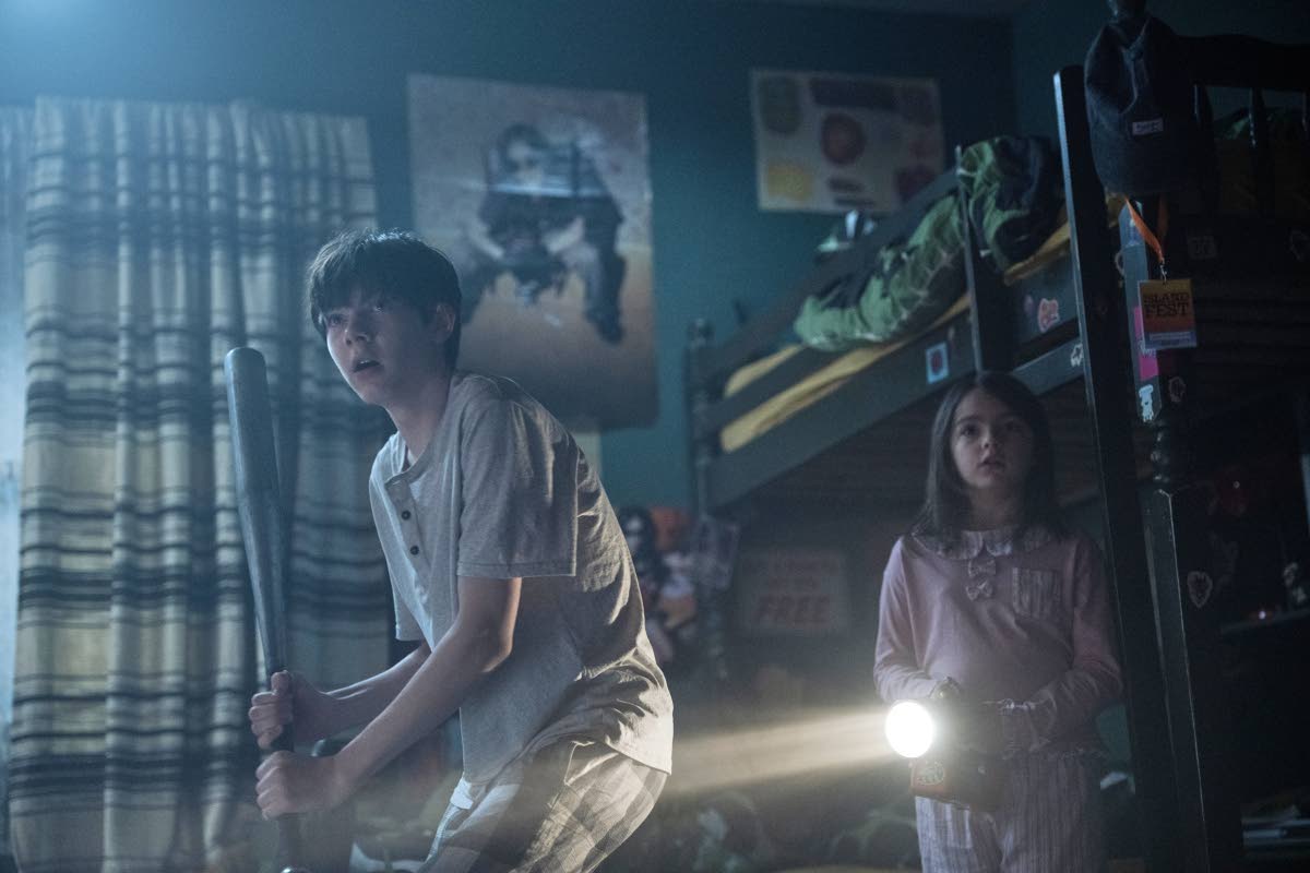 This image released by Warner Bros. Pictures shows Shylo Molina (left), and Billie Roy in a scene from 'Lee Cronin's The Mummy'.