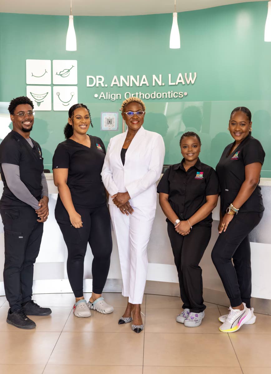 Dr Anna Law (centre) is happy to serve patients alongside her Align Orthodontics clinical team (from left) Junior Mitchell, Robyn Bennett, Saadique Fearon and Crisan Crisp.
