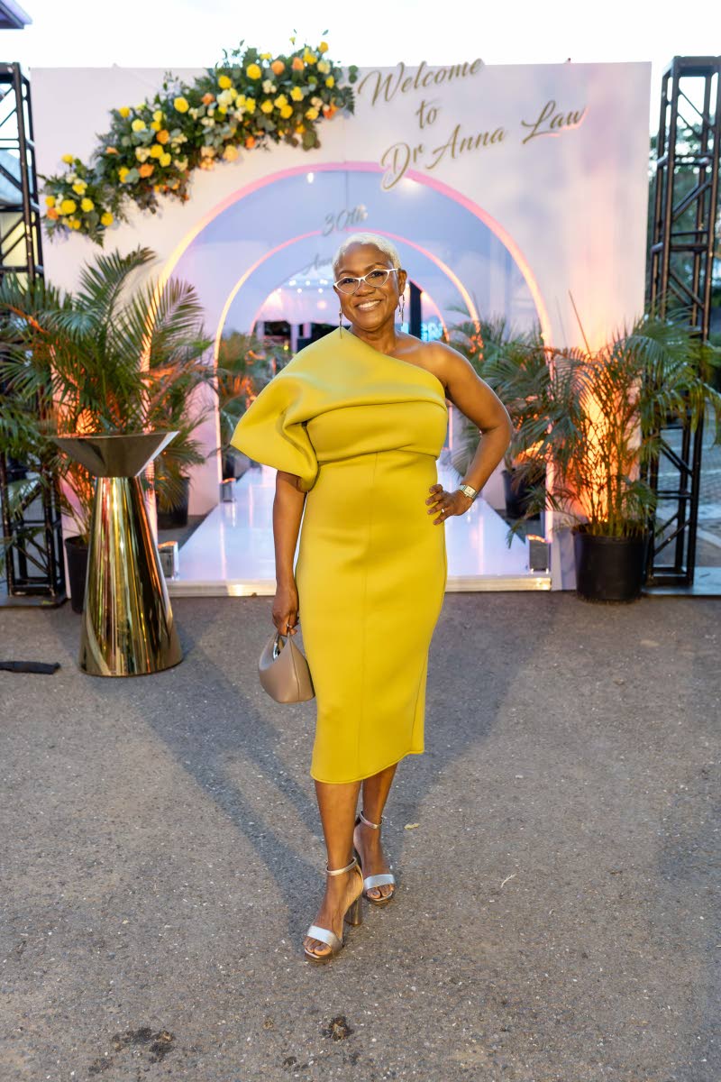 Dr Anna Law, founder of Align Orthodontics, poses in a vibrant midi as she marks the practice’s 30th anniversary.