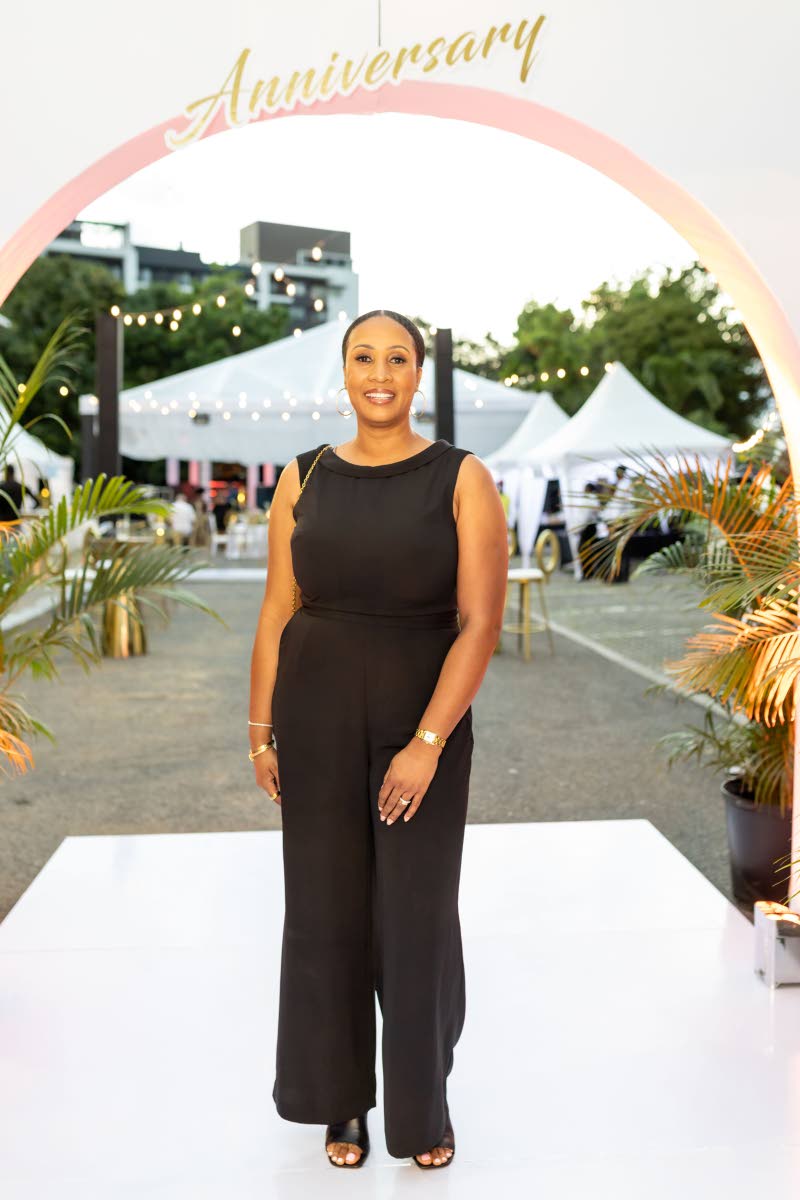 Dr Morissa McCreavy-Roberts, lead dentist and owner of New Hope Dental, supports colleague Dr Anna Law as she celebrates 30 years. 